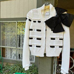 White cotton knit cardigan with black silk ribbon